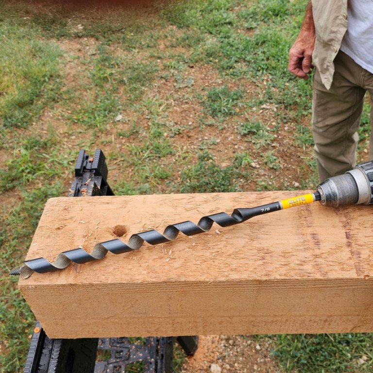 The eWalt Elite Series 7/8-Inch x 18-Inch Bi-Metal Auger Bit in use during testing