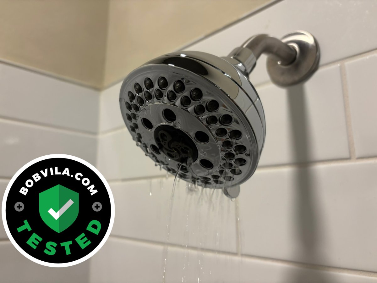 Delta H20kinetic 5-Setting Shower Head in the bathroom as an example of the best shower head for low pressure
