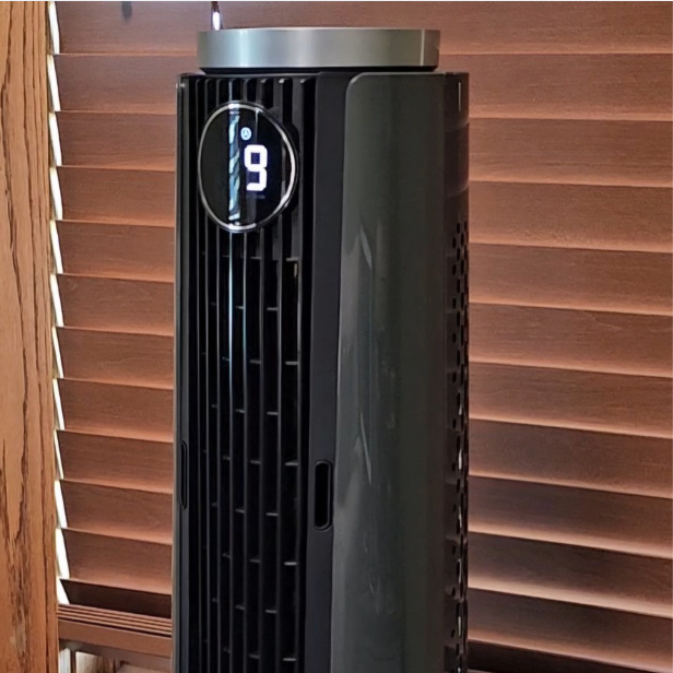 Dreo Misting Fan in front of wood blinds
