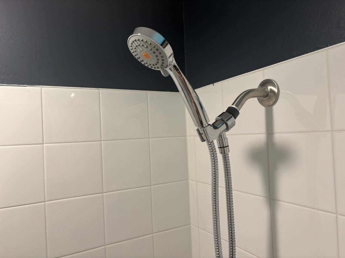 H02ME High-Pressure Handheld Shower Head in the bathroom as an example of the best shower head for low pressure