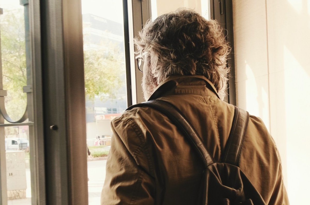 Middle aged man leaving home.