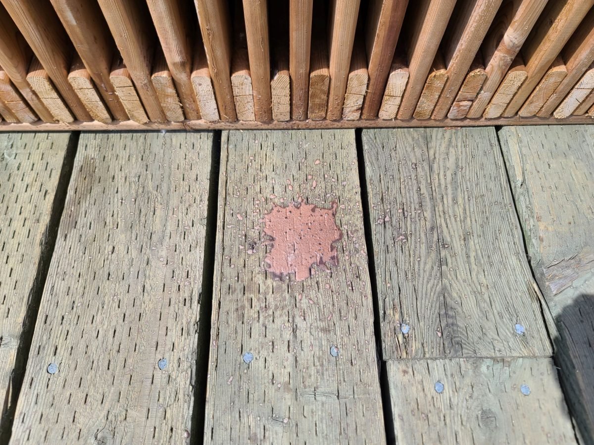 Poorly stained wood deck.