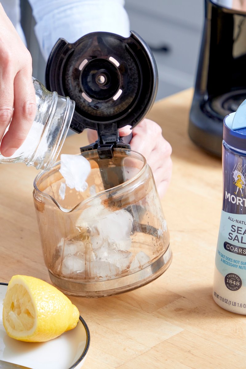 Ice cubes in a dirty coffee carafe.