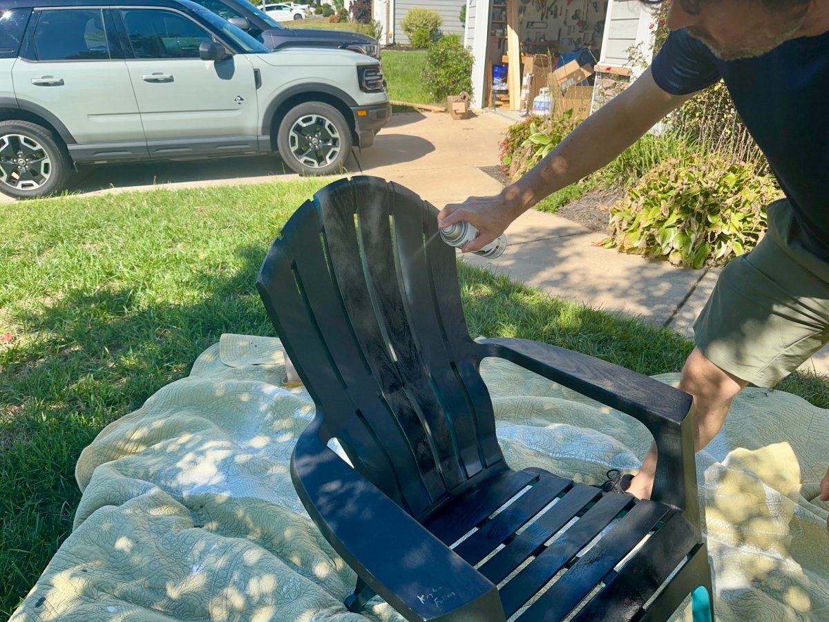 Spraying Chair with a Paint for Plastic