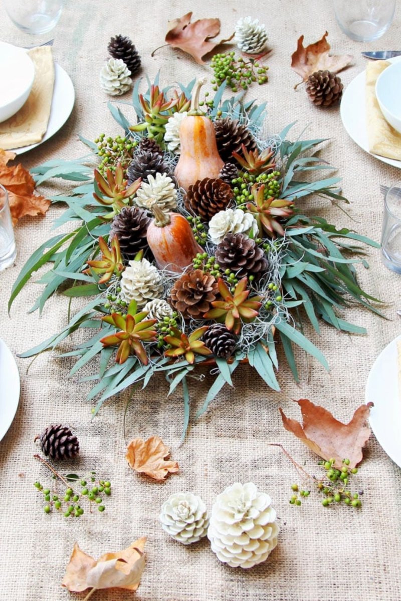 Thanksgiving table center piece with harvest vegetables.