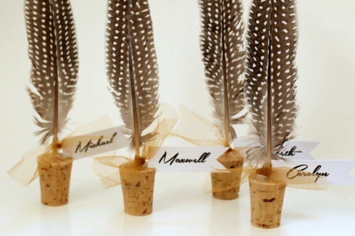 Feathers and cork used to create place cards.
