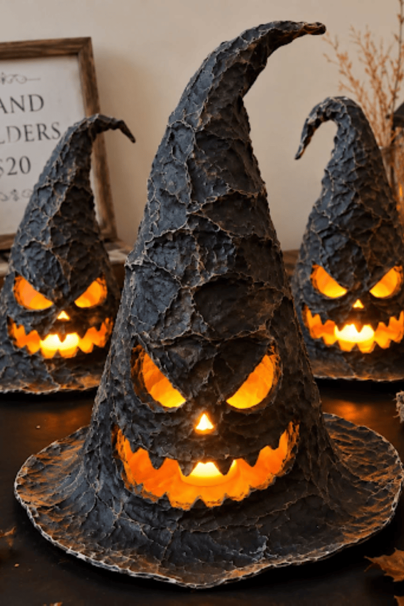 DIY witch chat lanterns with glowing faces.