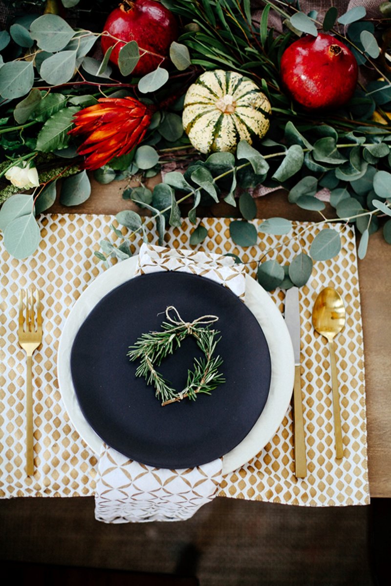Sprigs or rosemary tied with string to create a festive place marker.
