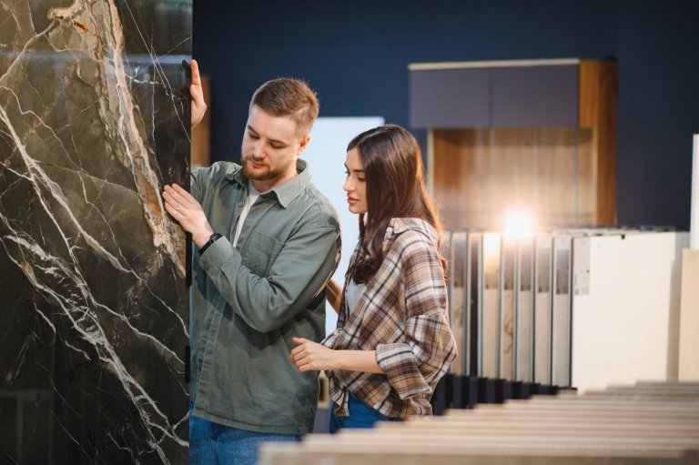 Young couple shopping for a kitchen countertop